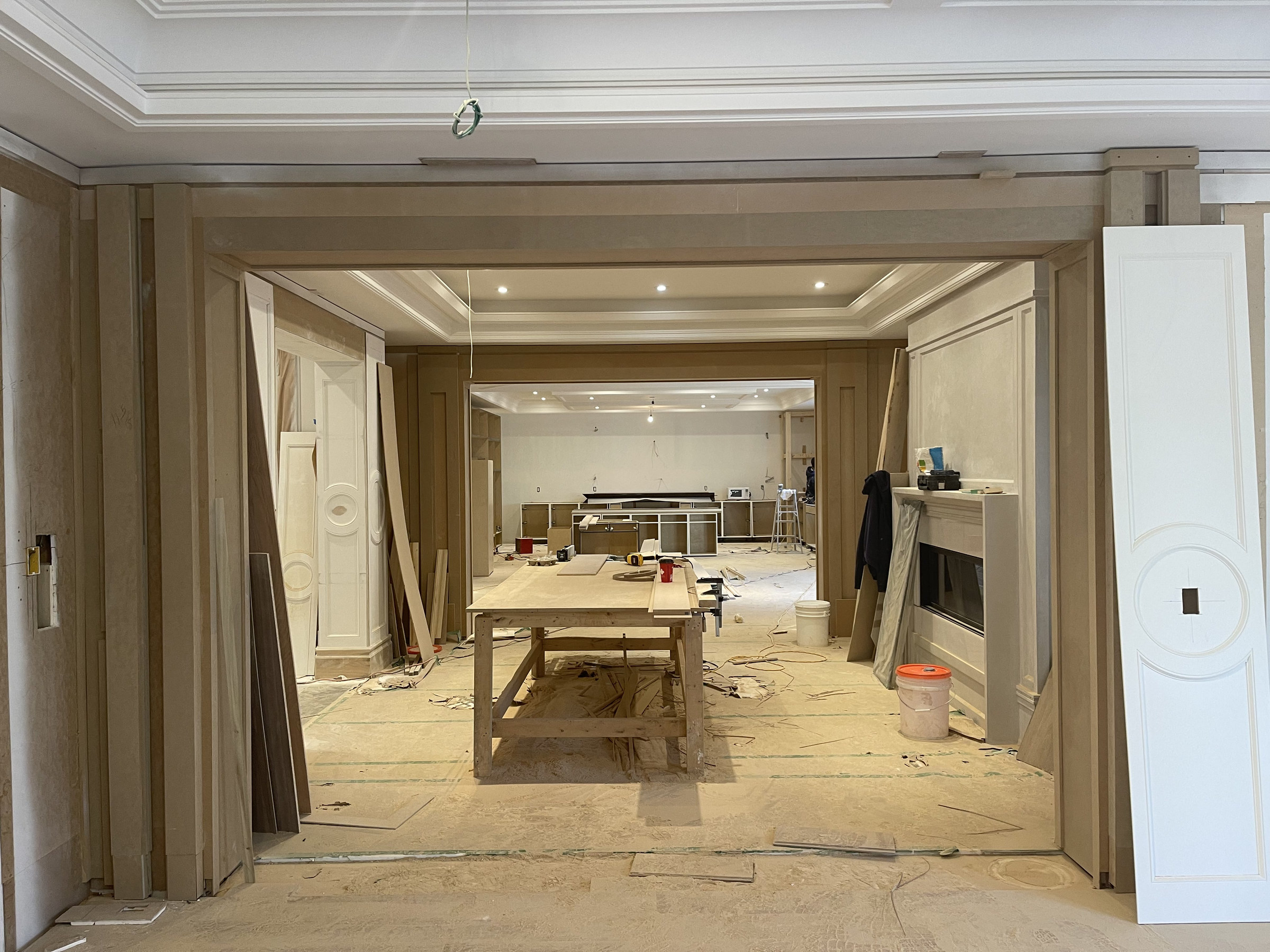 Bayview Ridge main floor during construction, panelled millwork — Studio Kimi interior design in Toronto