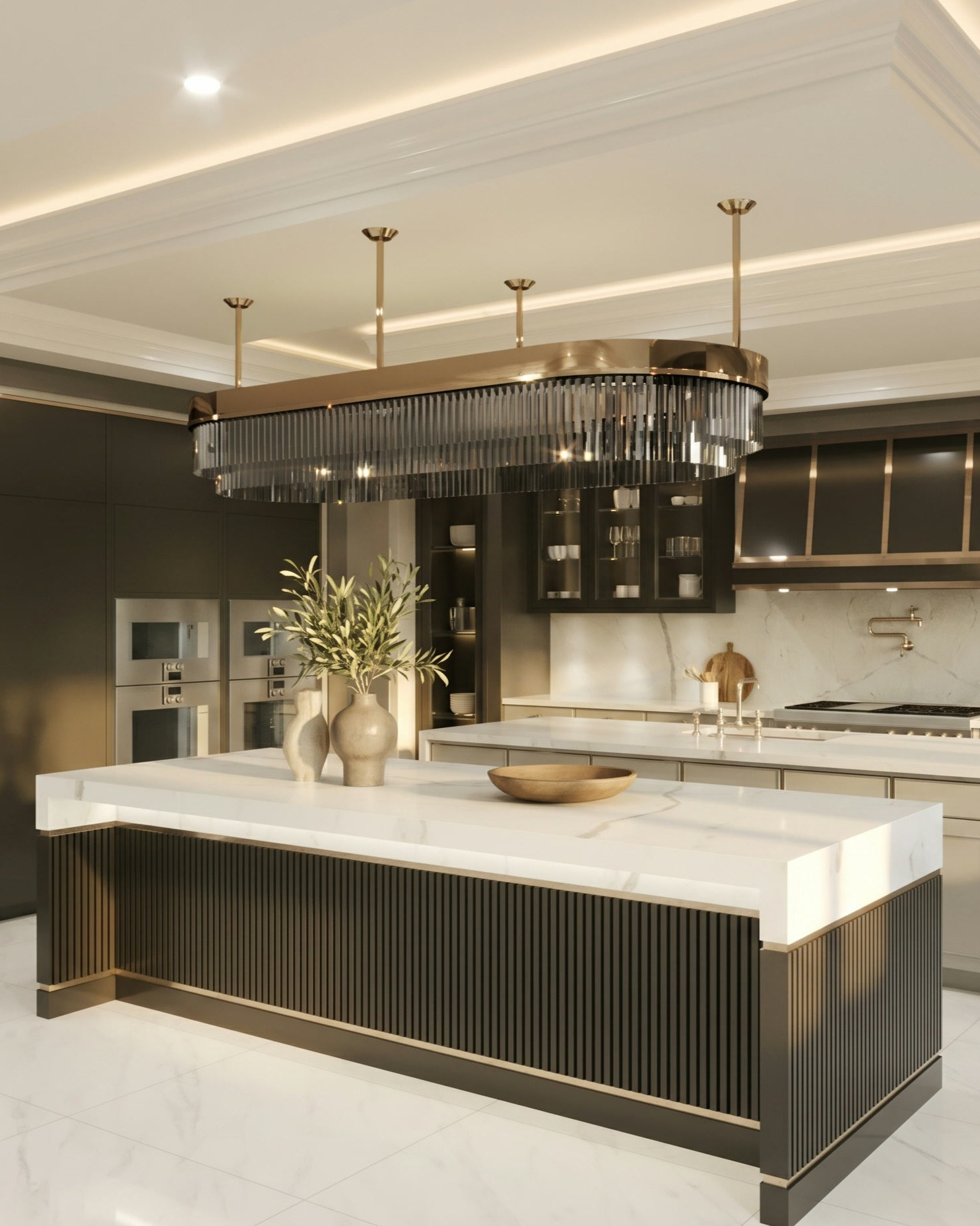 Bayview Ridge kitchen fluted charcoal-and-brass island — Studio Kimi interior design in Toronto