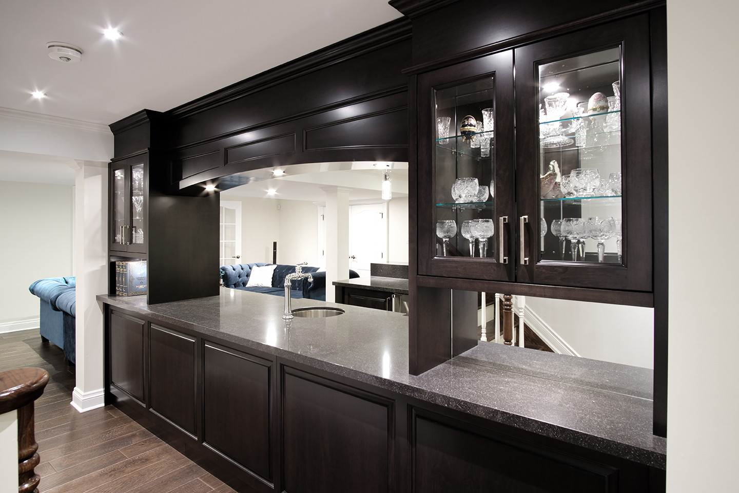 Home bar back with lit glass display cabinets — Burrowhill basement, Studio Kimi Mississauga
