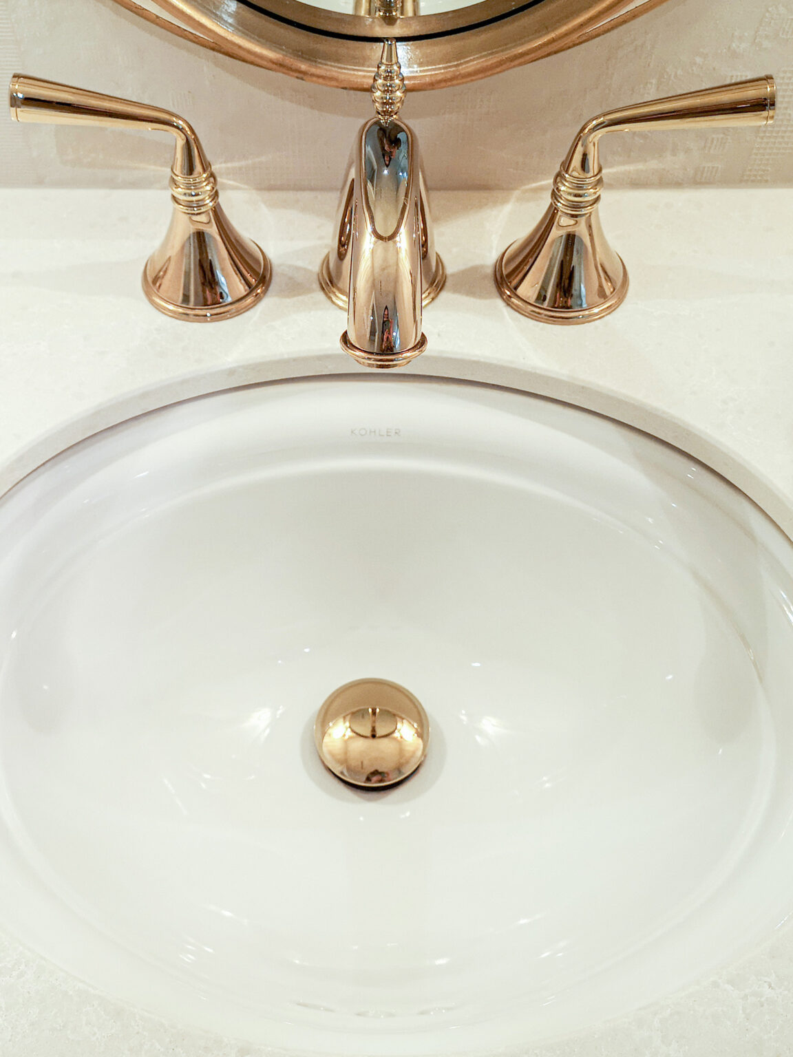 Gold faucet and basin detail — Burrowhill bathroom, Studio Kimi Mississauga
