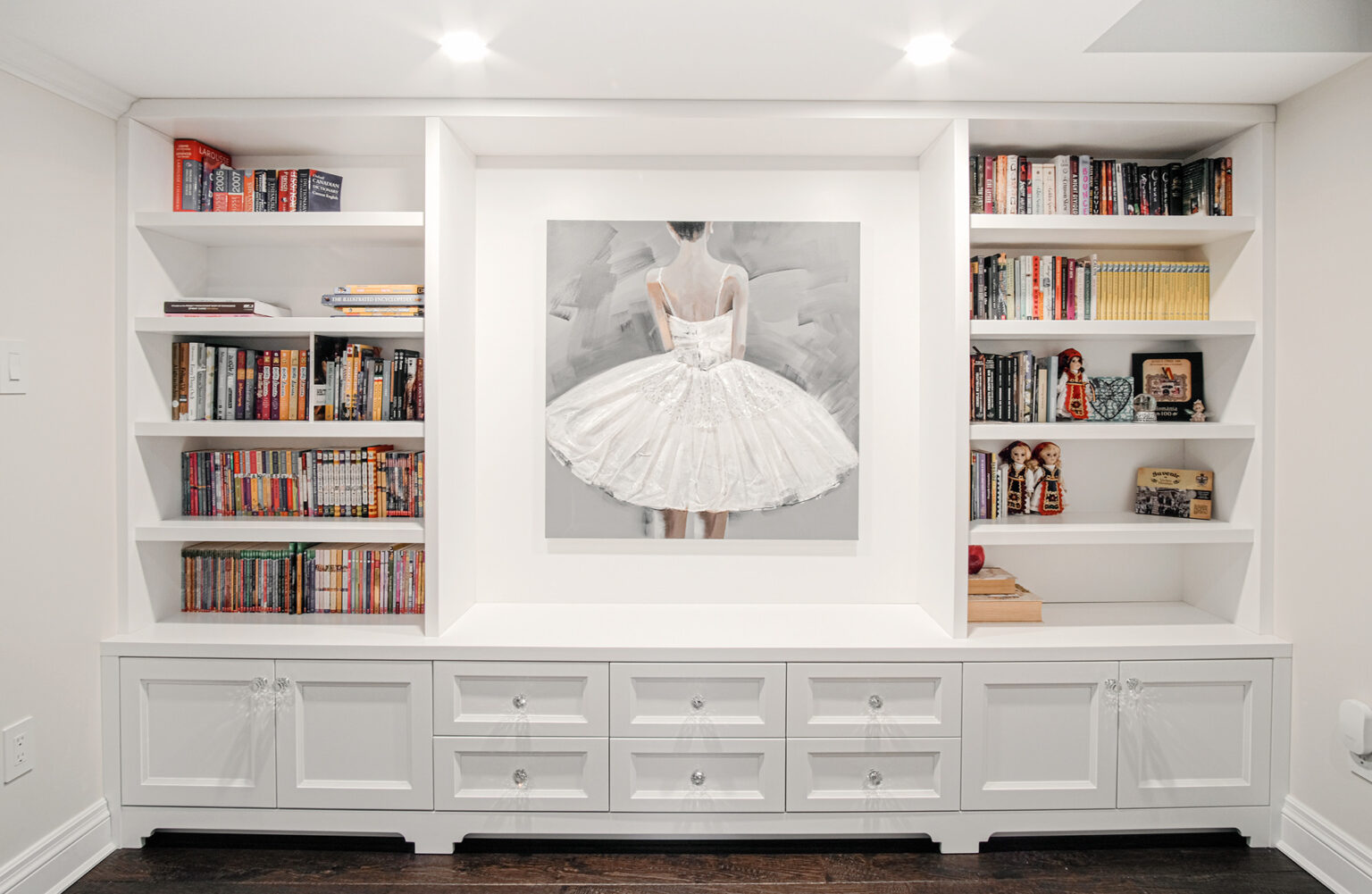 White built-in library bookcases — Burrowhill basement, Studio Kimi Mississauga