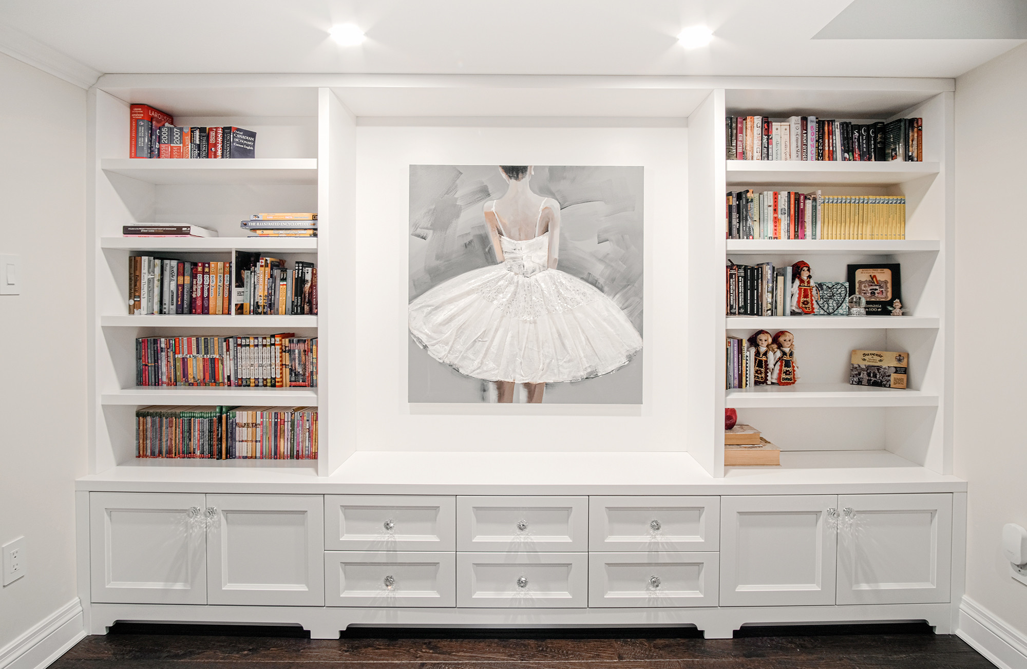 White built-in library bookcases — Burrowhill basement, Studio Kimi Mississauga