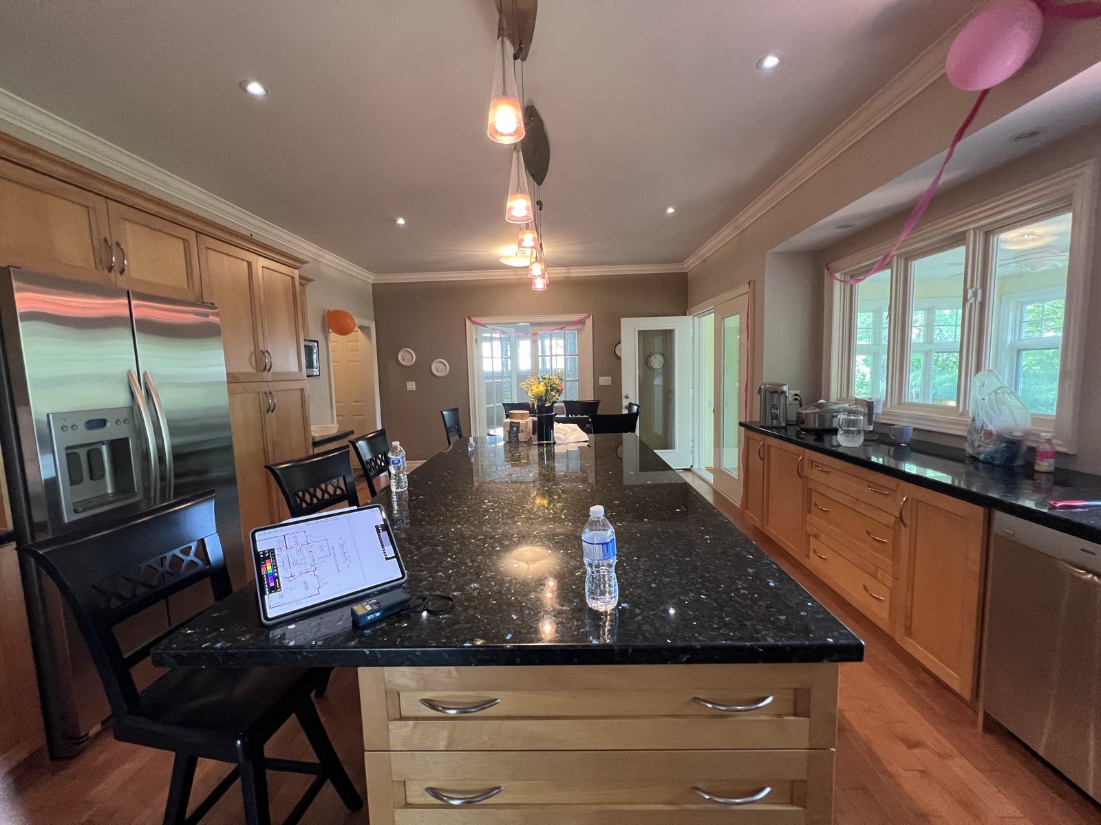 Duncan kitchen before renovation — original island and cabinetry, South-East Oakville