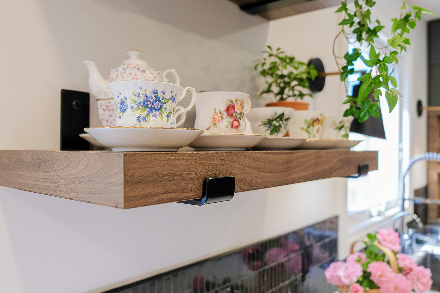 Floating wood shelves styled with teapots and plants — Ingram kitchen, Studio Kimi Mississauga