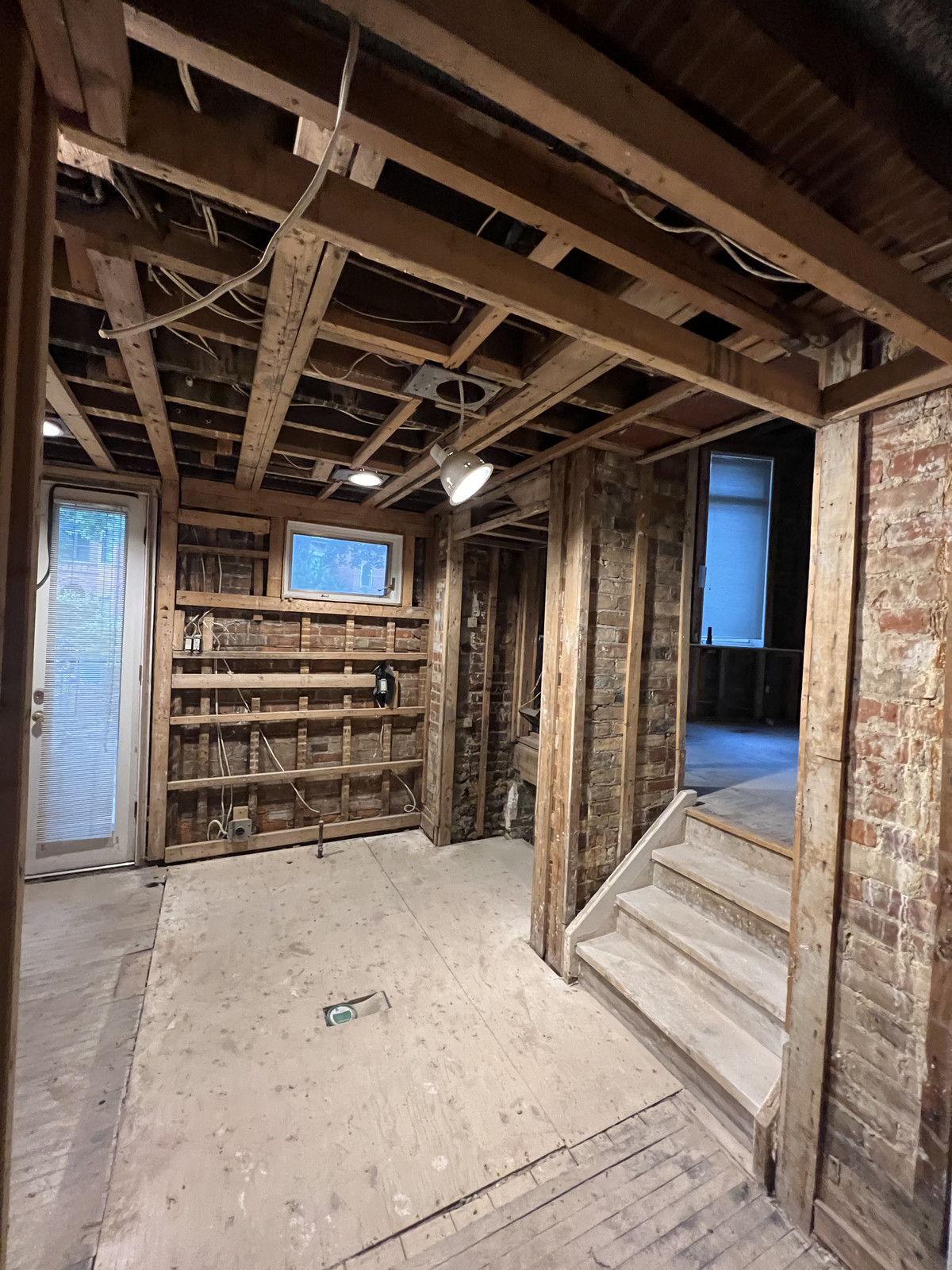 Construction and framing during a Studio Kimi home renovation