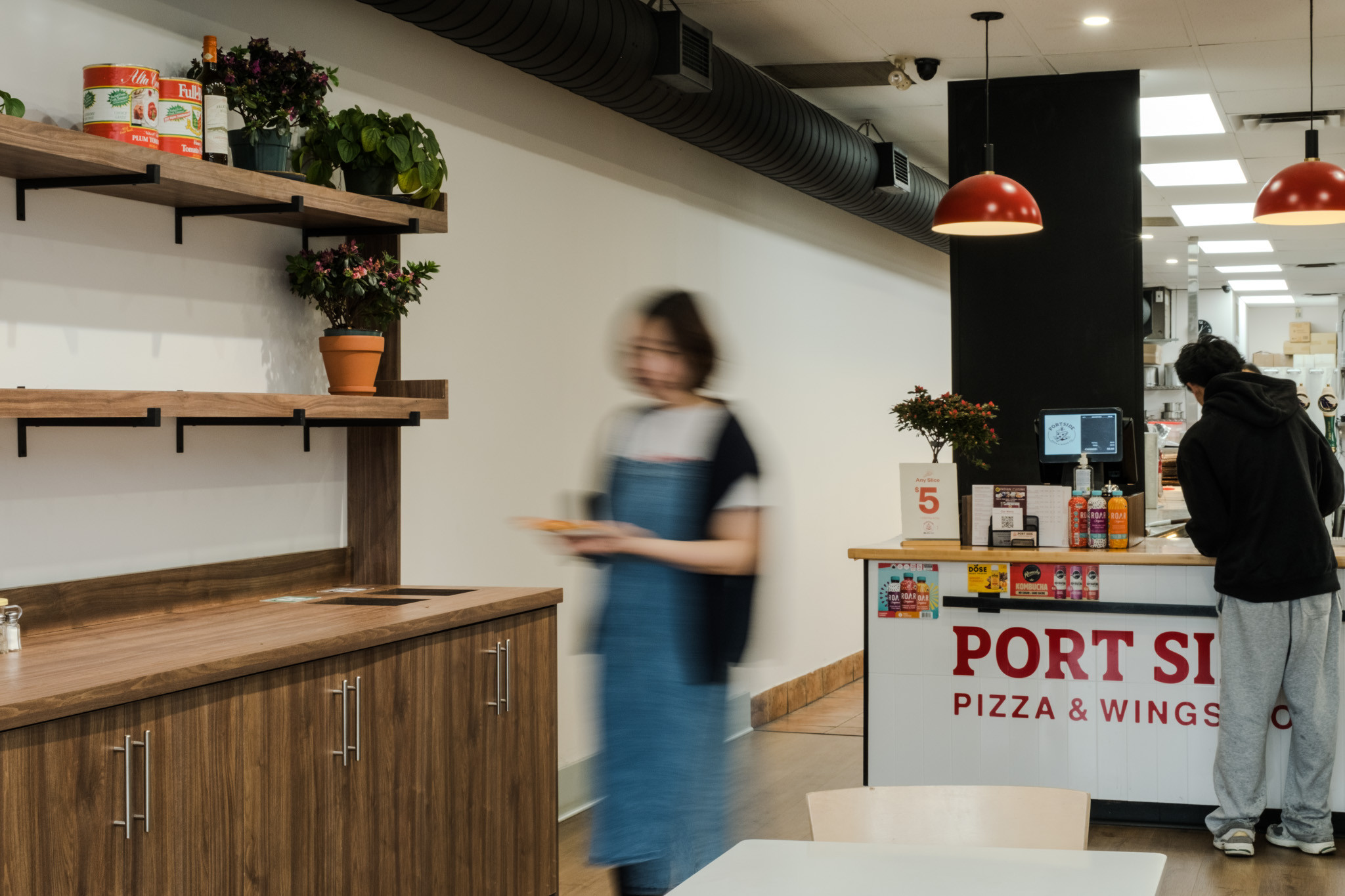 The counter from the side with plants