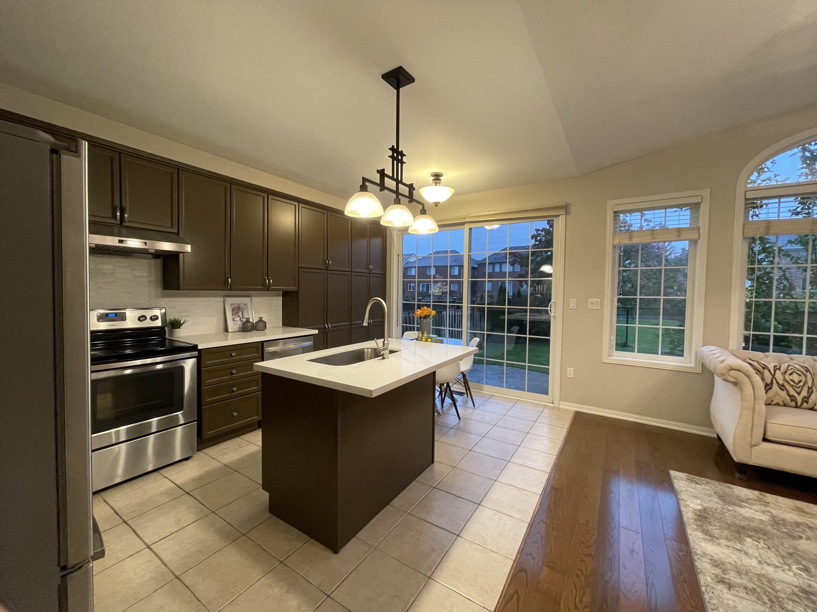 Rosanna kitchen before renovation &mdash; original dark traditional kitchen, Mississauga