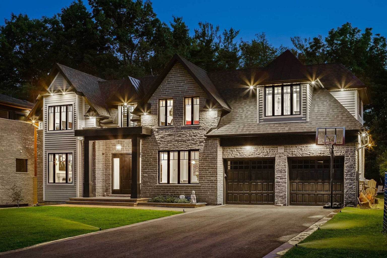 Sandwell custom home exterior — Studio Kimi interior design in Oakville