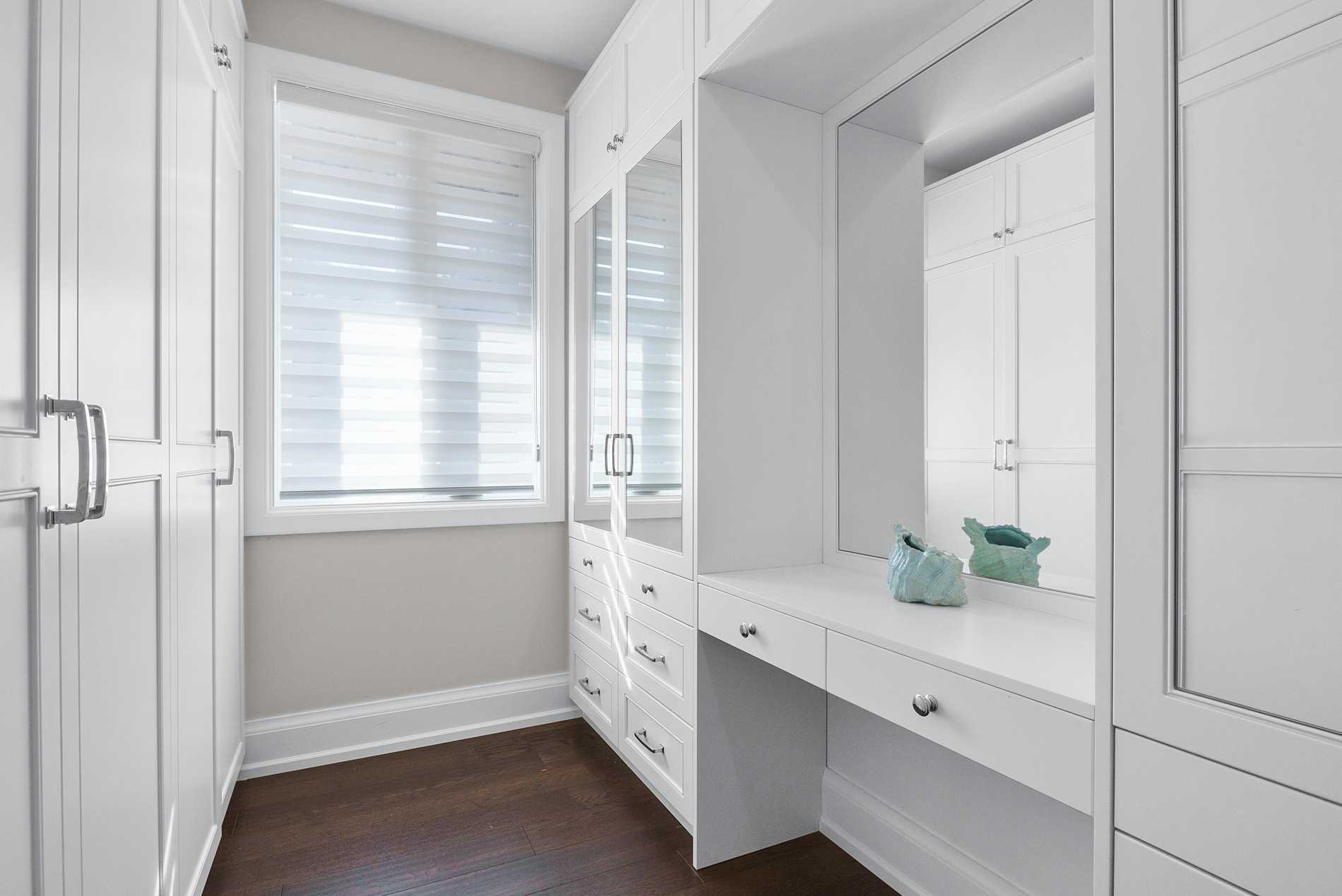 Sandwell walk-in closet — Studio Kimi interior design in Oakville
