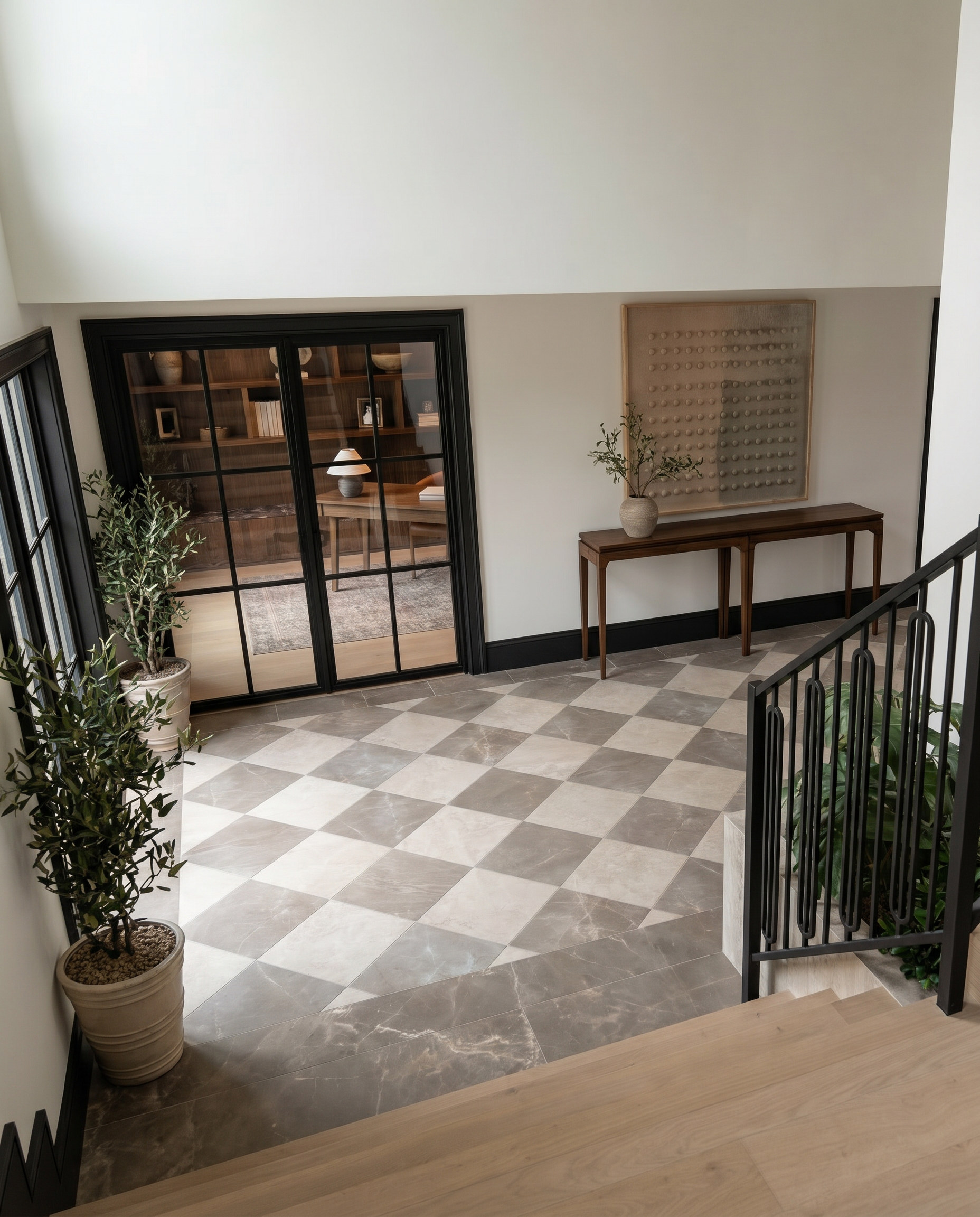 Sixth Lane foyer seen from the stair landing — Studio Kimi interior design in Milton