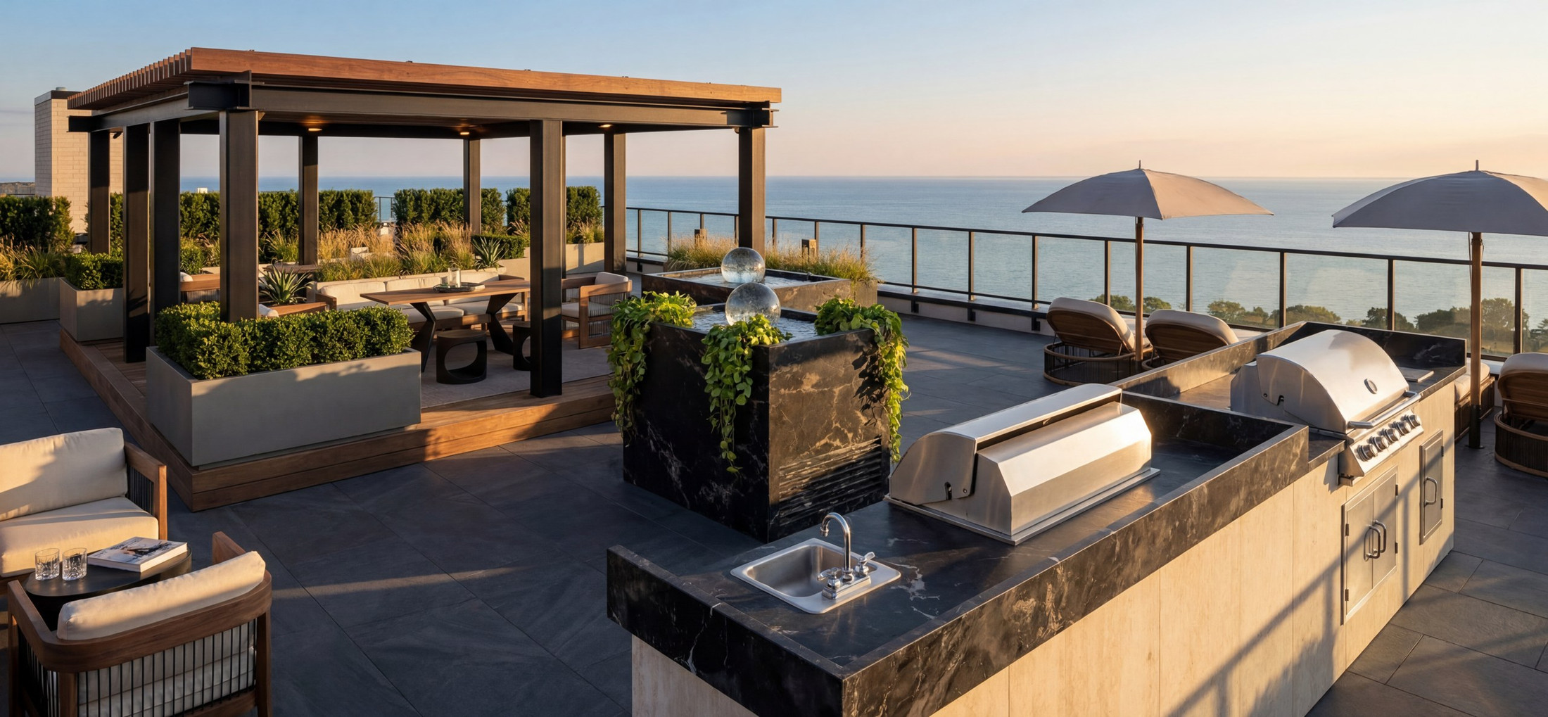 A rooftop terrace with lounge seating and an outdoor kitchen — Studio Kimi